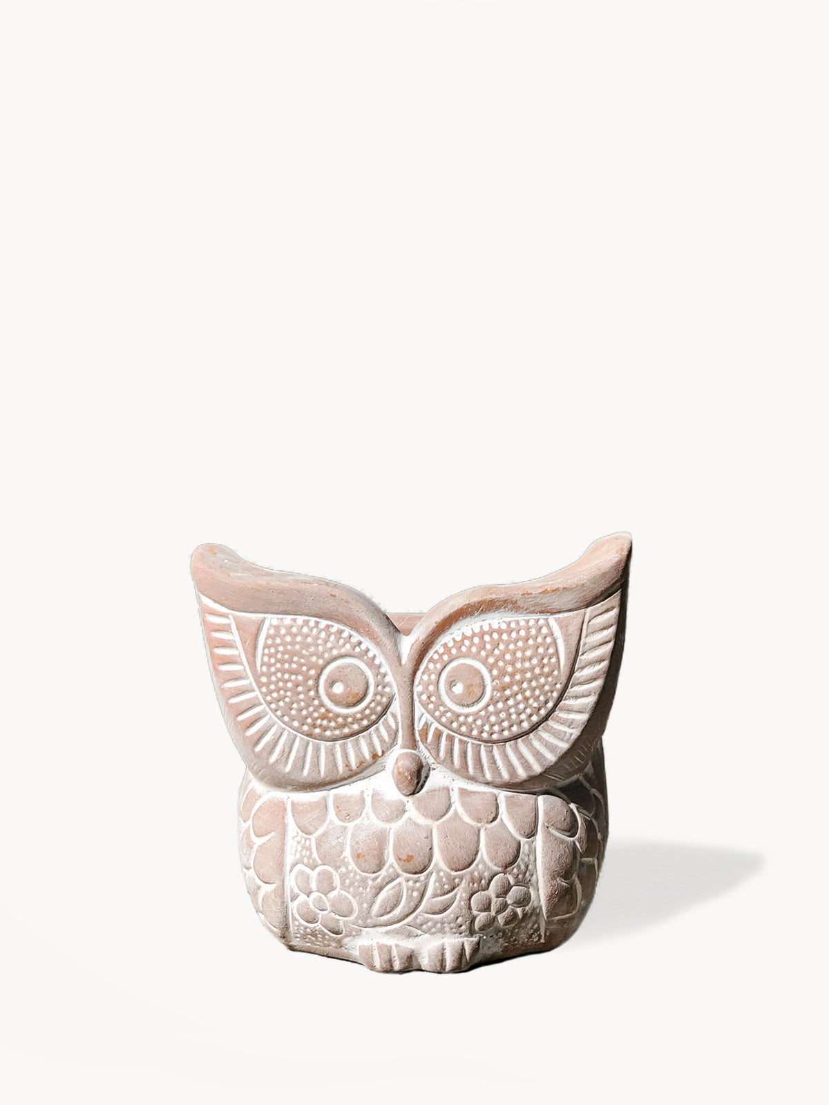 A Terracotta Pot - Big Eye Owl, featuring intricate patterns and large eyes, expertly crafted by skilled Fair Trade artisans, displayed against a plain white background.