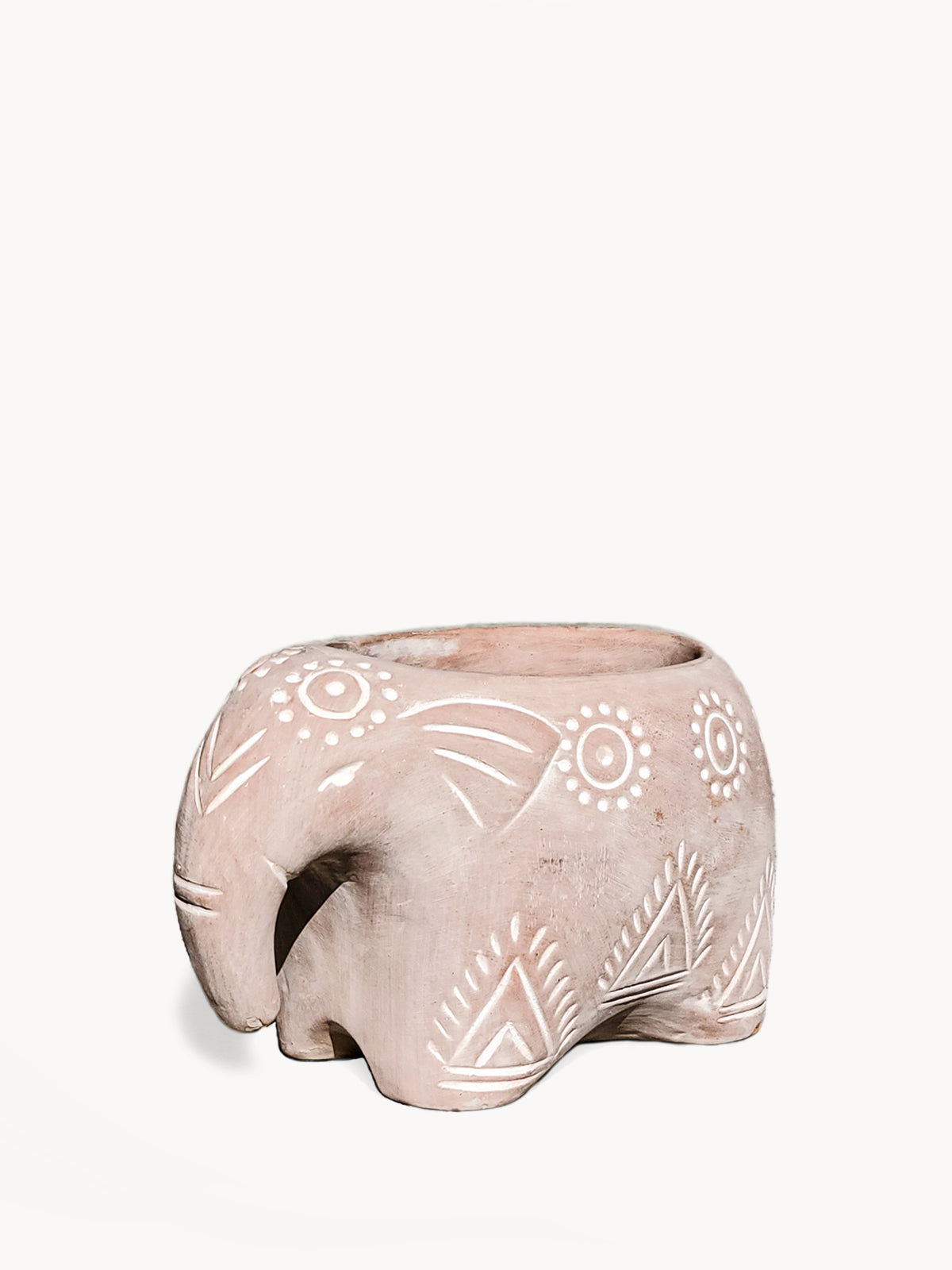 Introducing the Terracotta Pot - Folk Elephant, a captivating decorative planter crafted by Fair Trade artisans. This elephant-shaped piece showcases painted white geometric patterns on a plain background, making it an ideal choice for garden planters and adding an artistic charm to any space with its delightful animal-themed design.