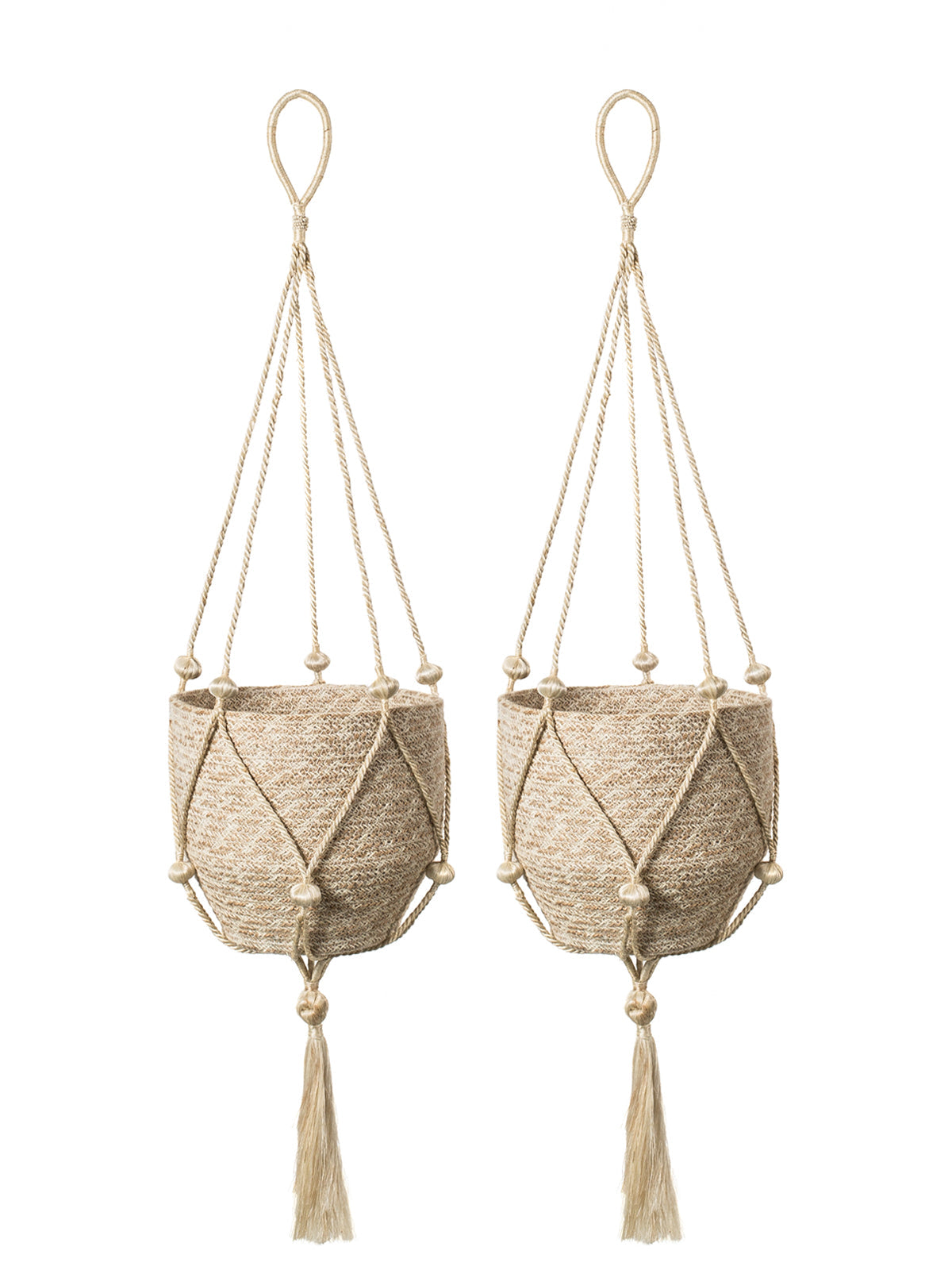 The Plant Hanger - Nadu features a woven basket with a black and natural fiber design, suspended by a handmade jute hanger adorned with braided and knotted ropes, complete with a tassel at the bottom.