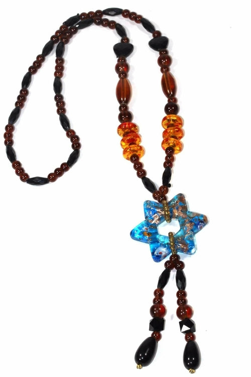 The Star Pendant Gypsy Style Shimmer Necklace features handmade jewelry with colored glass beads and a star-shaped pendant that displays a captivating blue and orange swirl pattern.