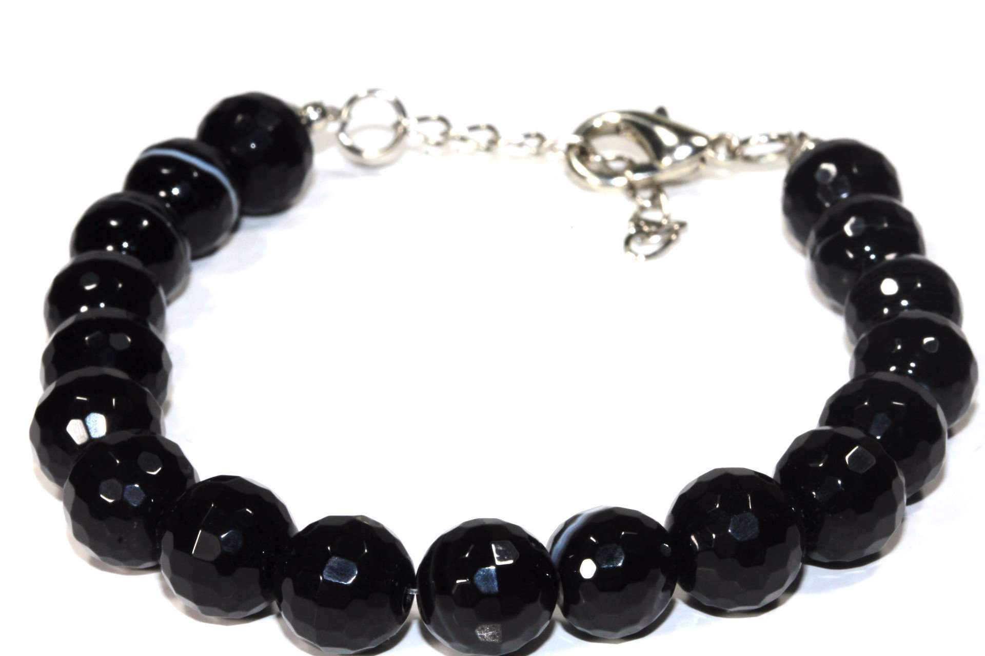 The Black Agate Yoga Bracelet showcases faceted beads and a silver clasp, designed to enhance inner strength and elegance.