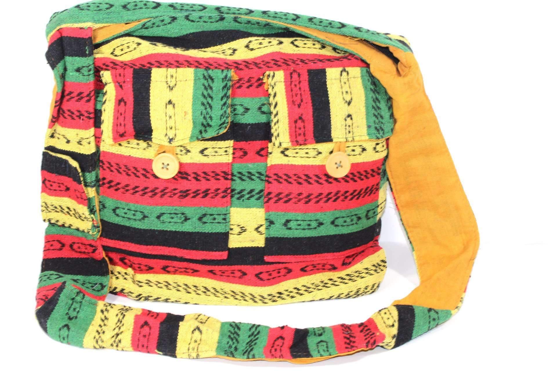 The Rasta Vibes Durrie Sling Bag is a colorful, handcrafted shoulder bag made from 100% cotton with vibrant red, yellow, green, and black stripes. It includes two small front pockets with wooden buttons, embodying traditional Rasta colors.