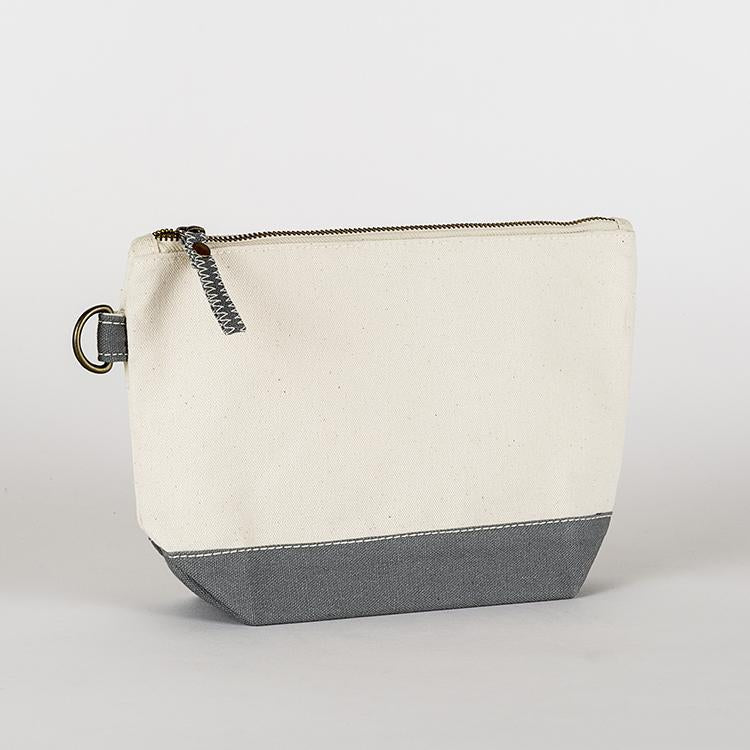 A small heavyweight canvas pouch with a black bottom, featuring a sturdy metal zipper and side loop detail, from the All In Zip Top Pouch collection.