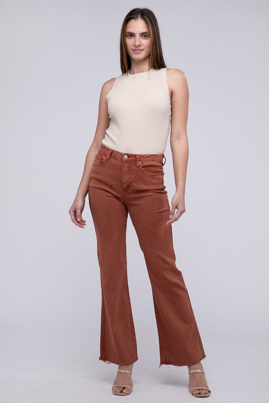 A person standing in Acid Washed Frayed Cutoff Hem Straight Wide Pants with black heeled sandals against a plain background.