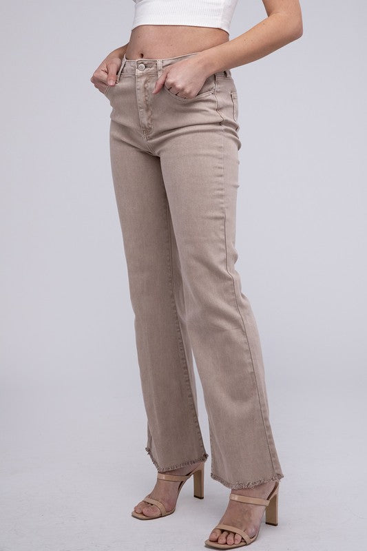 A person standing in Acid Washed Frayed Cutoff Hem Straight Wide Pants with black heeled sandals against a plain background.