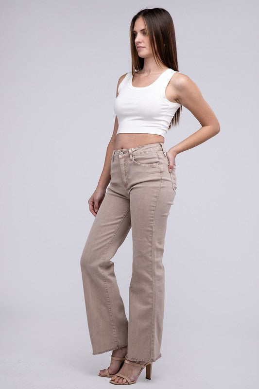 A person standing in Acid Washed Frayed Cutoff Hem Straight Wide Pants with black heeled sandals against a plain background.