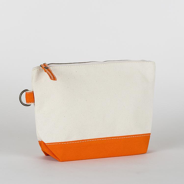 A small heavyweight canvas pouch with a black bottom, featuring a sturdy metal zipper and side loop detail, from the All In Zip Top Pouch collection.