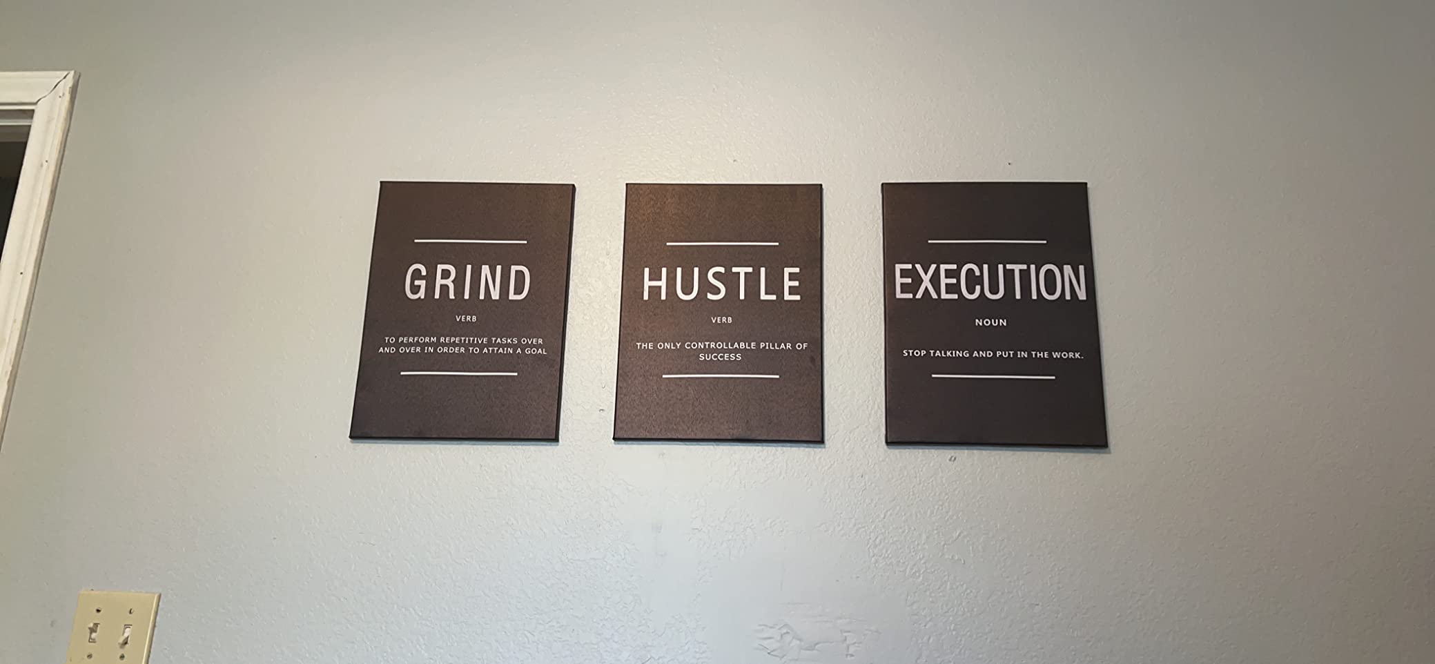 Explore the KAWAHONE Canvas Painting Wall Art set, featuring three distinct motivational posters on sleek black backgrounds, each emphasizing Grind, Hustle, and Execution. Enjoy fast shipping and secure payment options with every purchase to quickly inspire your space.