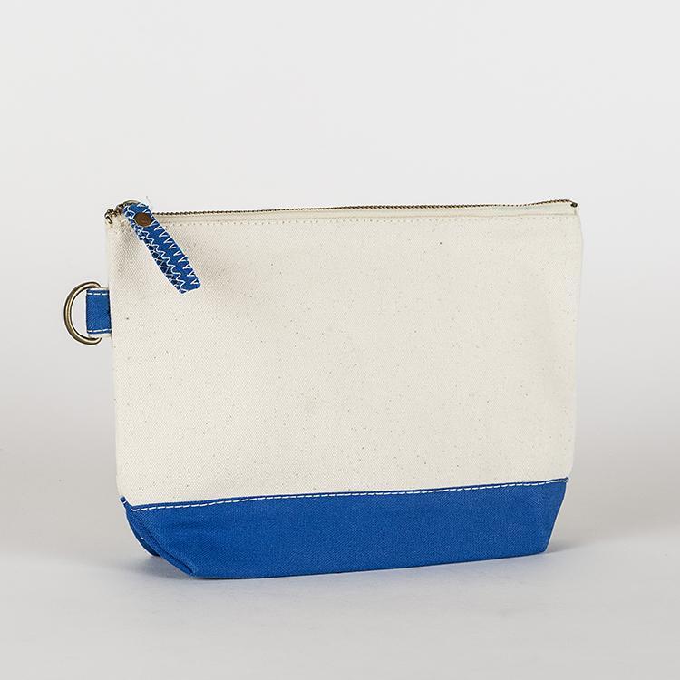 A small heavyweight canvas pouch with a black bottom, featuring a sturdy metal zipper and side loop detail, from the All In Zip Top Pouch collection.