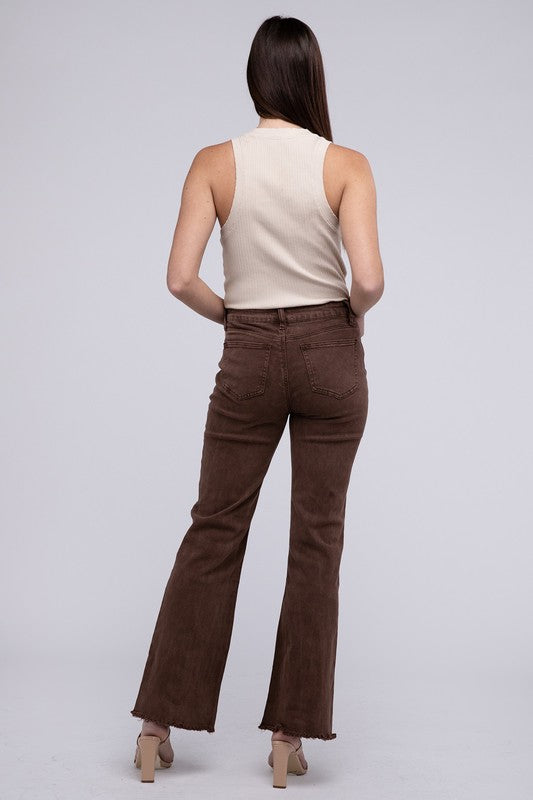 A person standing in Acid Washed Frayed Cutoff Hem Straight Wide Pants with black heeled sandals against a plain background.