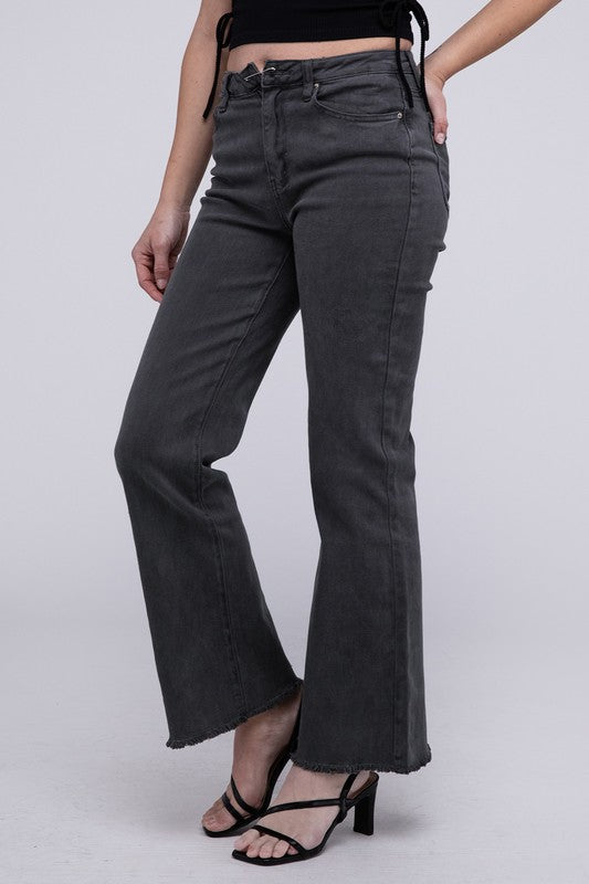 A person standing in Acid Washed Frayed Cutoff Hem Straight Wide Pants with black heeled sandals against a plain background.