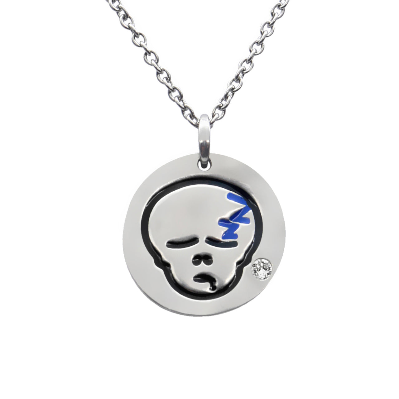 The Sleepy Skull Emoji Necklace With Crystal features a round pendant with a sleeping face emoji design, accented with blue Z's and a small Swarovski crystal. Crafted from durable stainless steel, it adds a playful touch to any outfit.