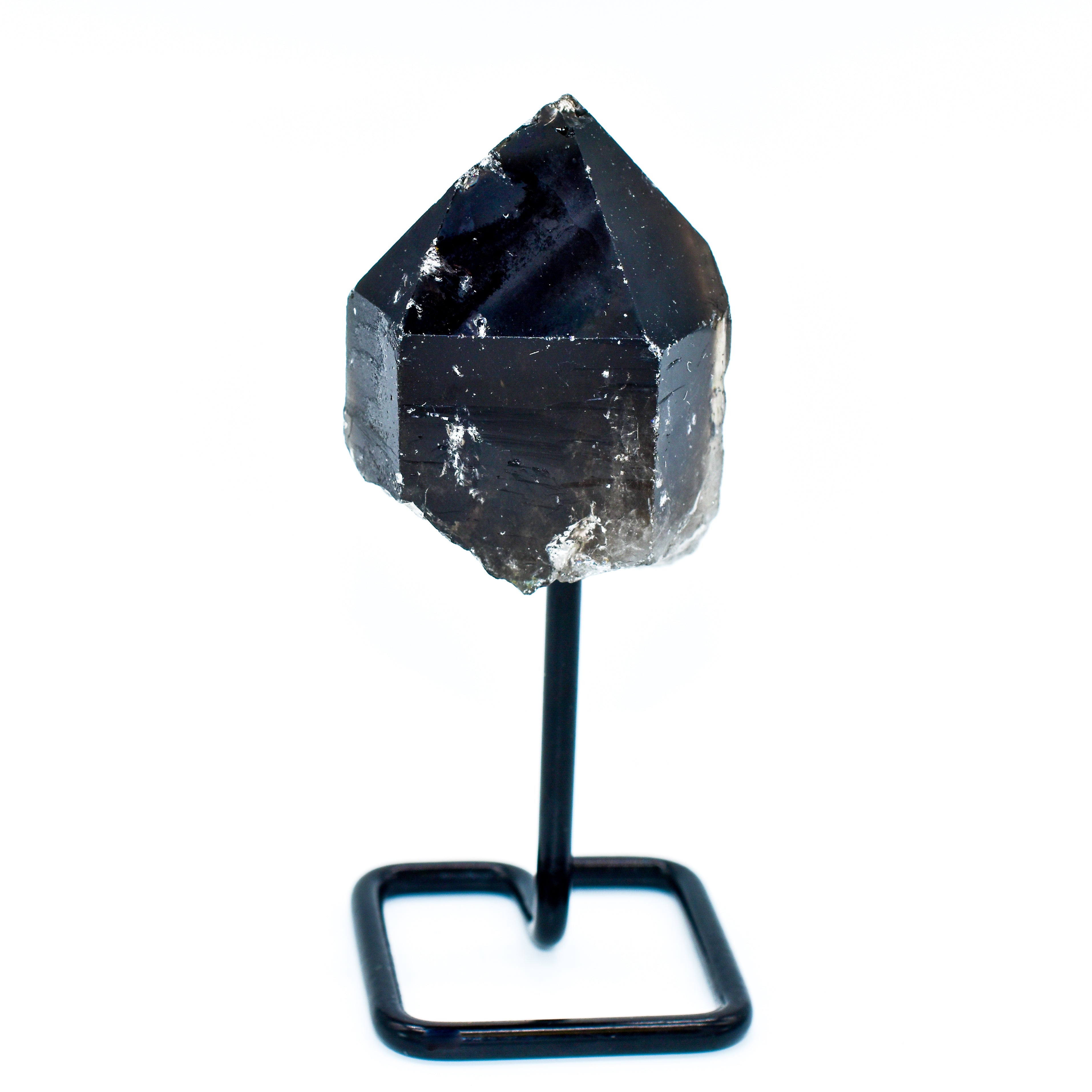 The Smokey Quartz Points on Metal Base Small Display Piece stands elegantly upright, adding a touch of sophistication to your home decor against a plain white background.