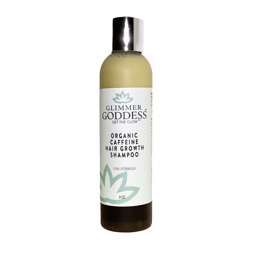 The Glimmer Goddess Organic Caffeine Hair Growth Shampoo, 9 oz, is crafted to address hair loss and boost hair volume. It comes with a green and brown label and is capped with an elegant silver top.