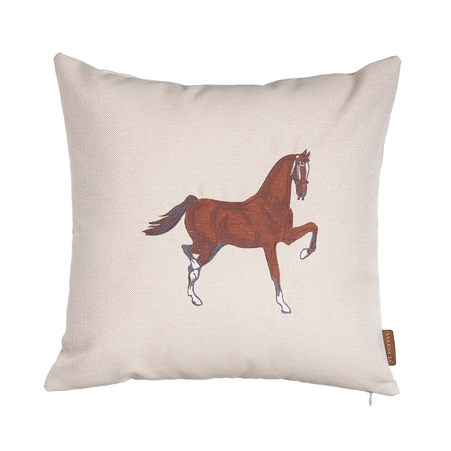 Placed on a brown sofa is the Boho Embroidered Horse Throw Pillow, a solid beige and brown square cushion measuring 18" x 18", featuring an illustration of a horse and made with recycled polyester filling, ensuring OEKO-TEX certification.