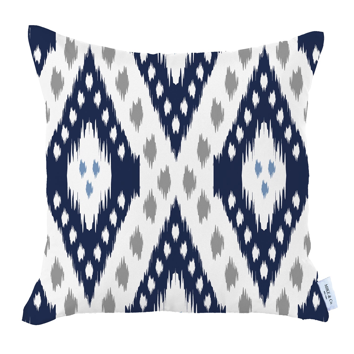 A pair of pillow covers from the Ikat Set of 2 Square 18’’x18’’ Boho Throw Pillow Covers, showcasing a blue and white ikat design with hidden zipper closures, are placed on a brown sofa. In the background, you can see a potted plant and a staircase.