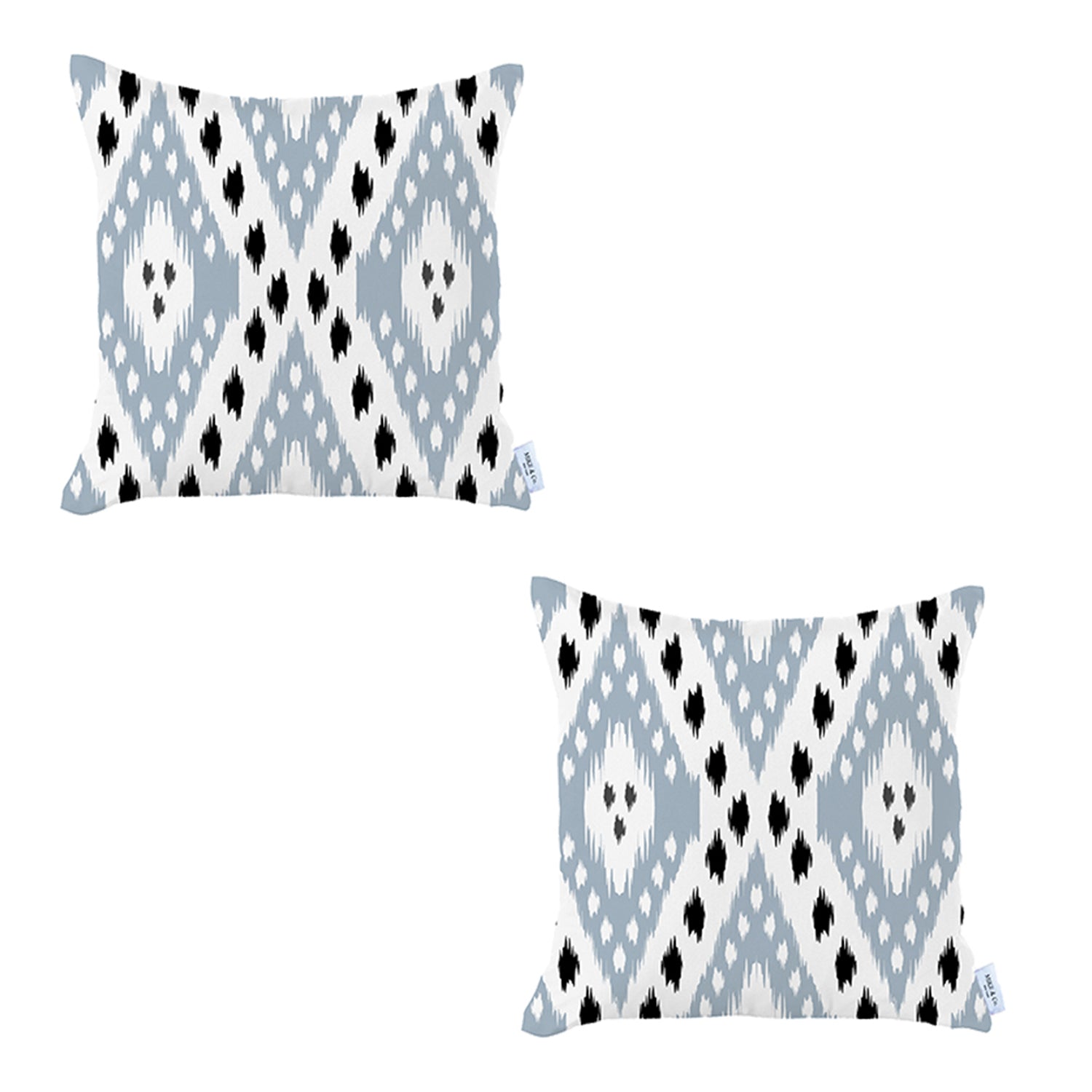 A pair of pillow covers from the Ikat Set of 2 Square 18’’x18’’ Boho Throw Pillow Covers, showcasing a blue and white ikat design with hidden zipper closures, are placed on a brown sofa. In the background, you can see a potted plant and a staircase.