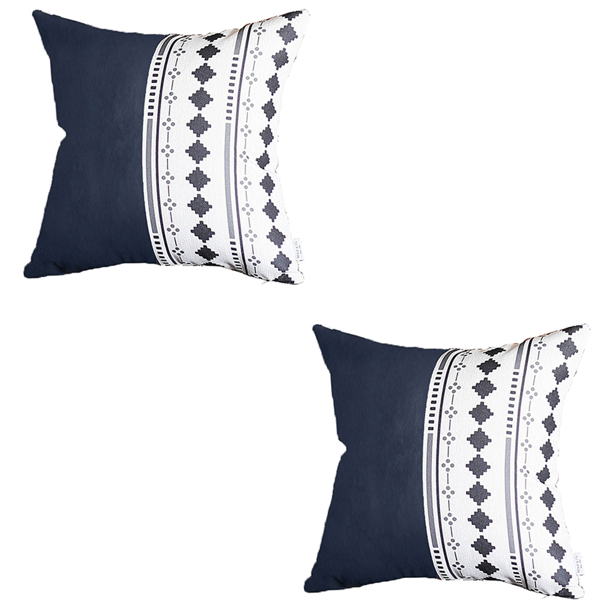 A pair of decorative pillows, featuring one in orange and another with a geometric design, are placed on a gray sofa in a modern living room. The Boho Set of 2 Handcrafted Decorative Throw Pillow Covers, made from vegan faux leather with geometric patterns, add an artistic flair that enhances the chic and cozy feel of the space.