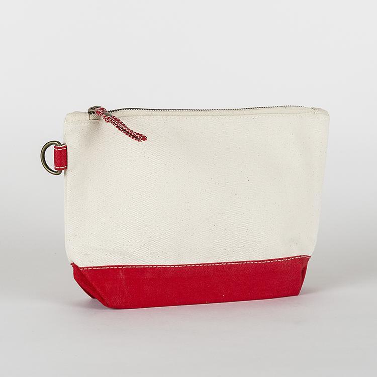 A small heavyweight canvas pouch with a black bottom, featuring a sturdy metal zipper and side loop detail, from the All In Zip Top Pouch collection.