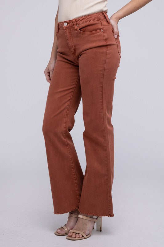 A person standing in Acid Washed Frayed Cutoff Hem Straight Wide Pants with black heeled sandals against a plain background.