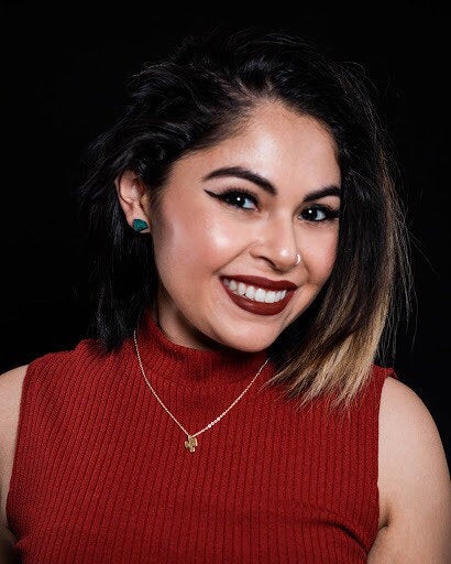 Close-up of Raw Chrysocolla Chunk Earrings, Rock Stud Earrings, Crystal Earrings with surgical steel earring posts on a dark gray background.