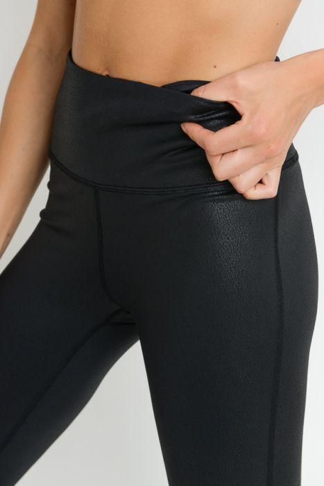 A person wearing Highwaist Foil Scale Print Full Leggings and black sneakers stands against a white background.