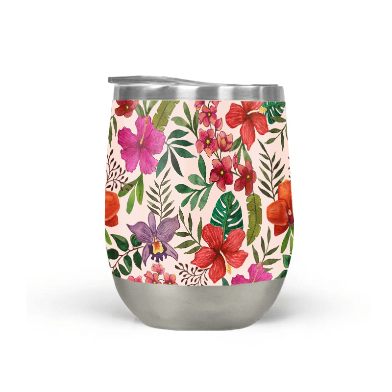 The Pink Tropical Flower Stemless Wine Tumbler features a stainless steel construction with double-wall insulation, adorned with red, pink, and purple floral motifs and green leaves set against a marble surface with a blurred background.