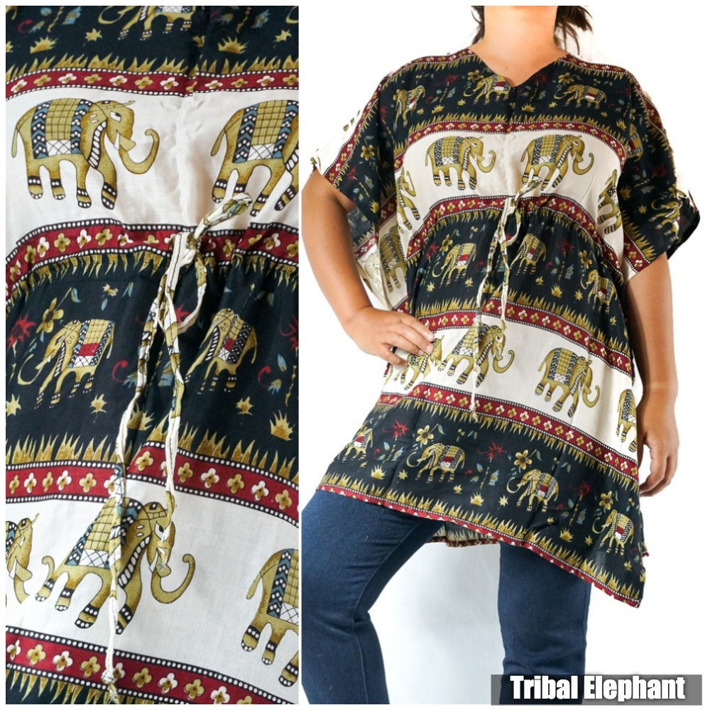A Boho Elephant Kaftan Dress, crafted from breathable rayon, showcases a bold black tunic with white elephant and floral patterns. The wearer confidently places one hand on their hip as the brand "big elephant" subtly features in the corner.