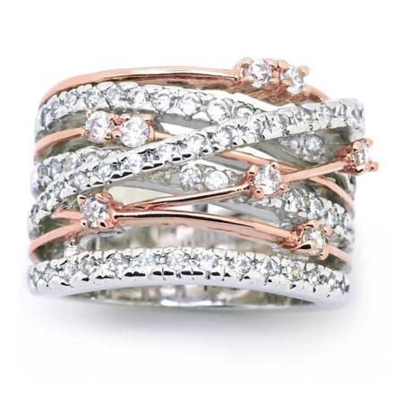 The Crystal Crossover Ring features intertwined rose gold and silver bands adorned with small diamonds for a dazzling effect.