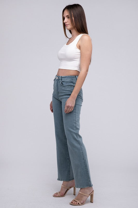 A person standing in Acid Washed Frayed Cutoff Hem Straight Wide Pants with black heeled sandals against a plain background.