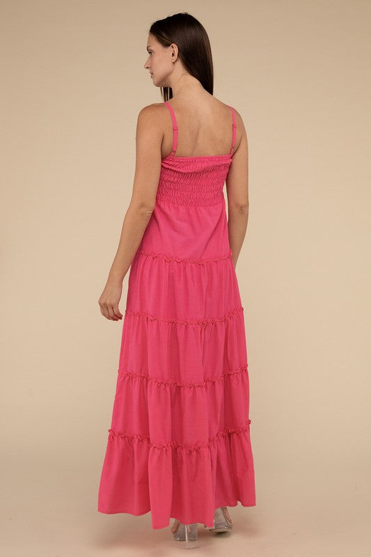 A woman modeling a Woven Smocked Top Tiered Cami Maxi Dress against a neutral background.