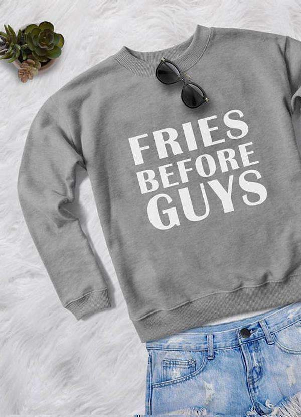The FRIES BEFORE GUYS WOMEN PRINTED SWEAT SHIRT, styled with sunglasses and denim shorts on a white background, offers an effortless look. Discover this unique piece online for seamless shopping.