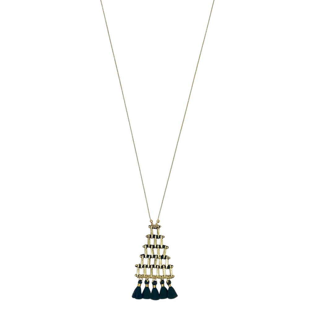 The Kai Pyramid Necklace is a gold-tone statement piece with a geometric grid design, featuring black tassels that gracefully hang at the bottom, adding an elegant touch.