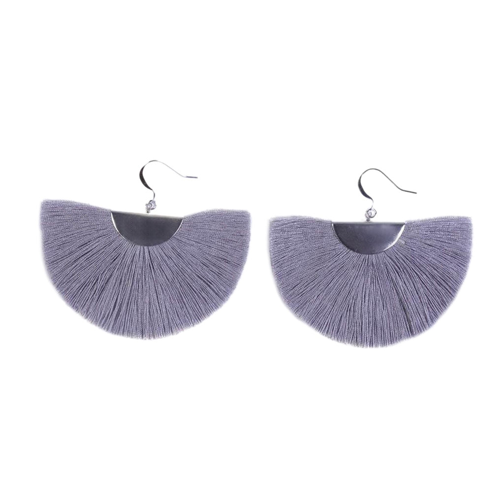 Silver Half Moon Fan Earrings feature black fringe with silver semicircular tops and hooks, intricately crafted in bohemian style. Handmade in Thailand, these elegant drop earrings are showcased against a white background.
