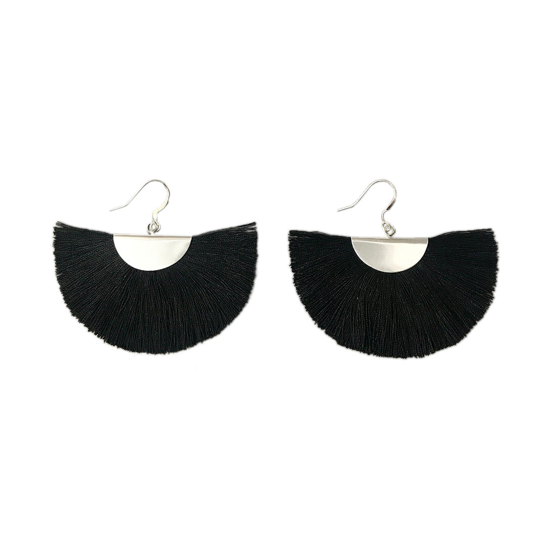 Silver Half Moon Fan Earrings feature black fringe with silver semicircular tops and hooks, intricately crafted in bohemian style. Handmade in Thailand, these elegant drop earrings are showcased against a white background.
