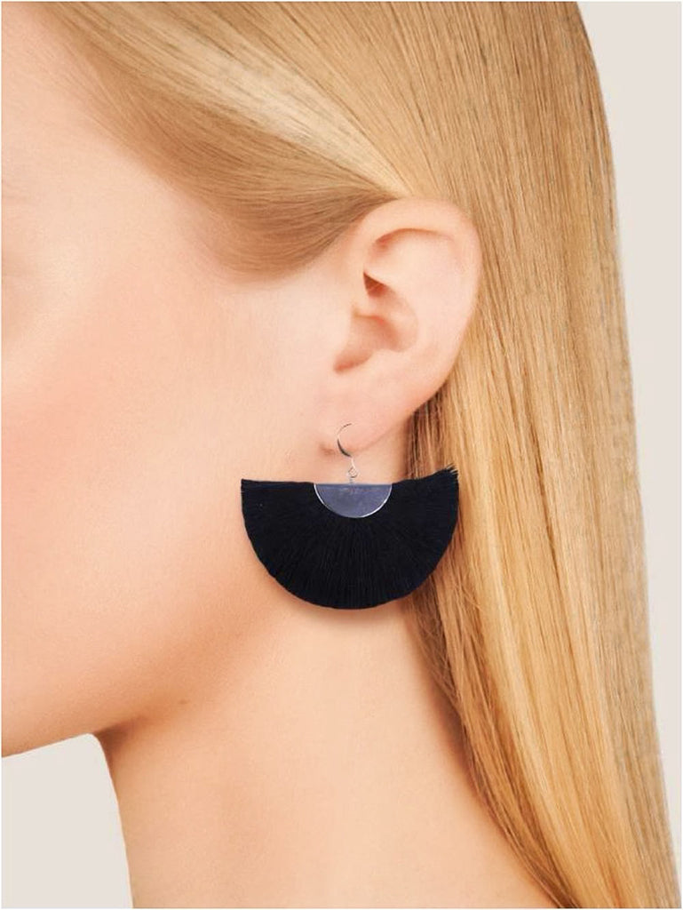 Silver Half Moon Fan Earrings feature black fringe with silver semicircular tops and hooks, intricately crafted in bohemian style. Handmade in Thailand, these elegant drop earrings are showcased against a white background.