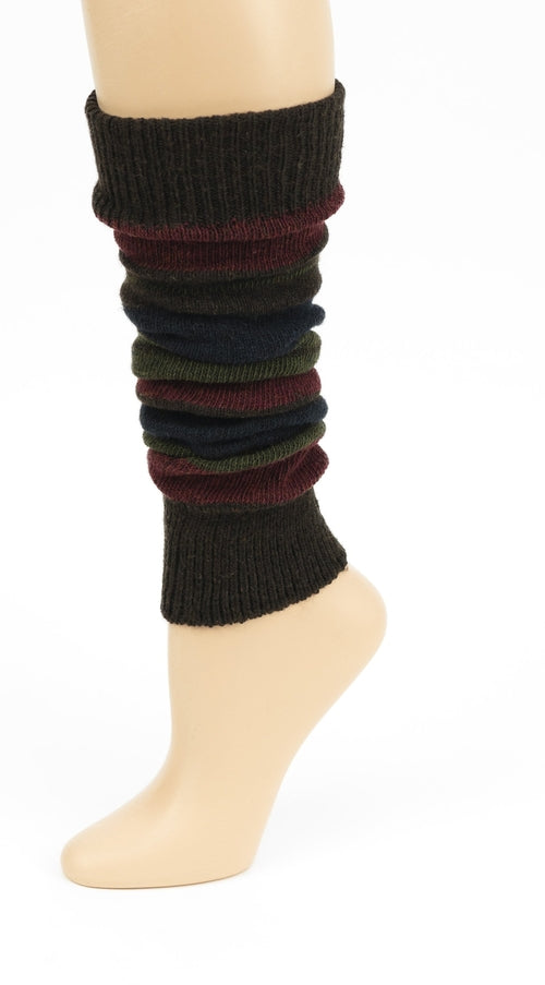 The Girl's Stripe Lambswool Knee Hi Leg Warmers, adorned with colorful stripes in blue, pink, purple, and white, are showcased on a mannequin leg as cozy essentials for the cold season.