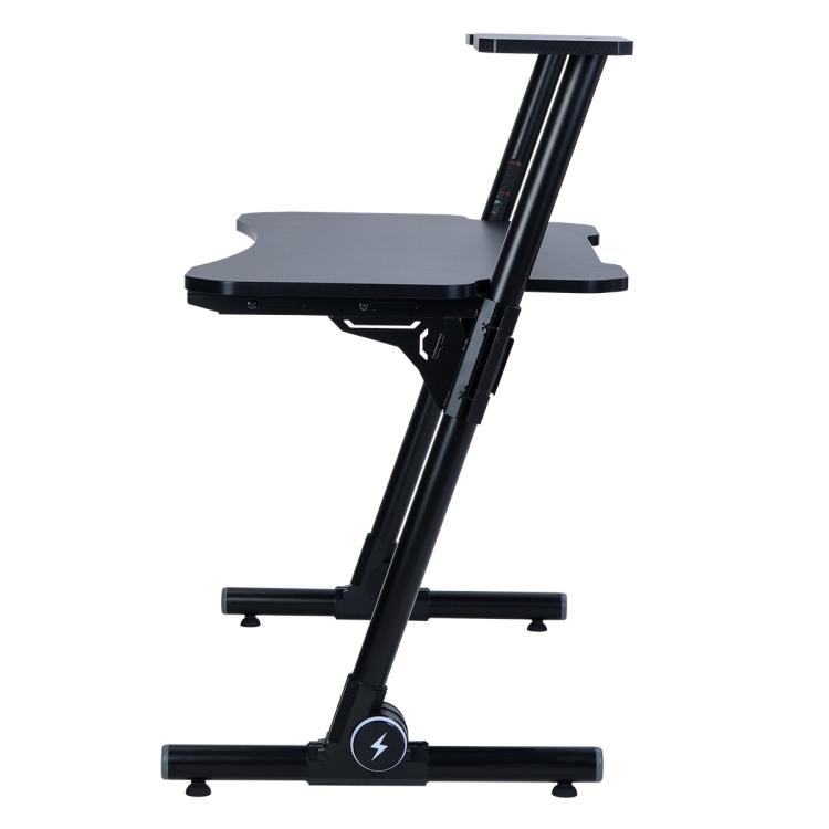 A black ModernMazing Z-Shaped Home Office Computer Gaming Desk Workstation with Carbon Fiber Surface and two legs.