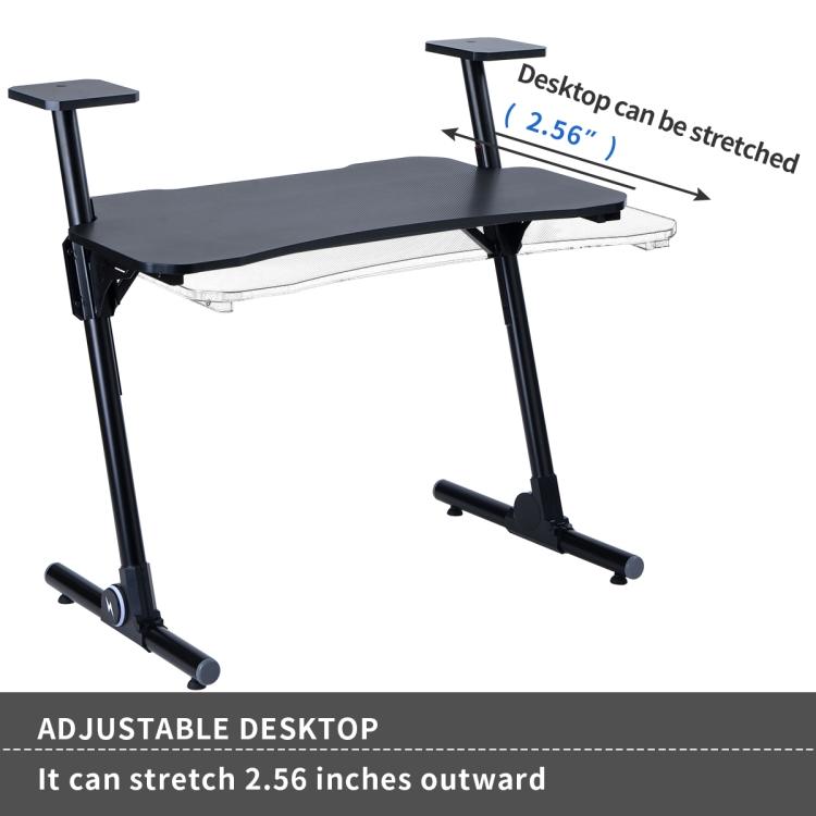 A black ModernMazing Z-Shaped Home Office Computer Gaming Desk Workstation with Carbon Fiber Surface and two legs.