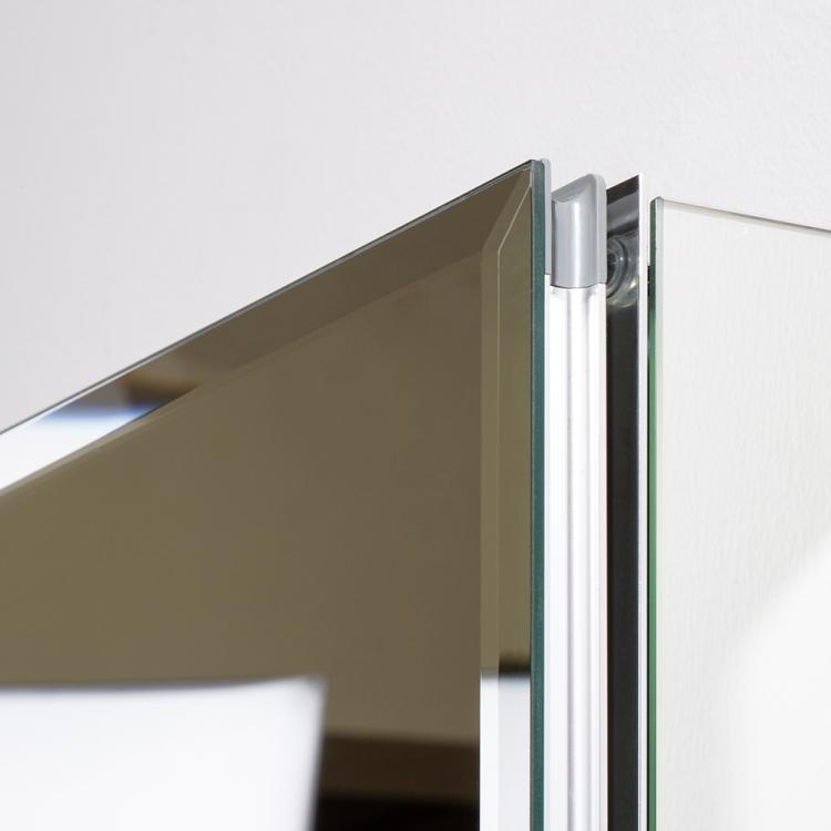 A bathroom with a ModernMazing Aluminum Wall-mounted Single Door Bathroom Mirror Cabinet with Adjustable Shelf, Size: 26 and a plant next to it.