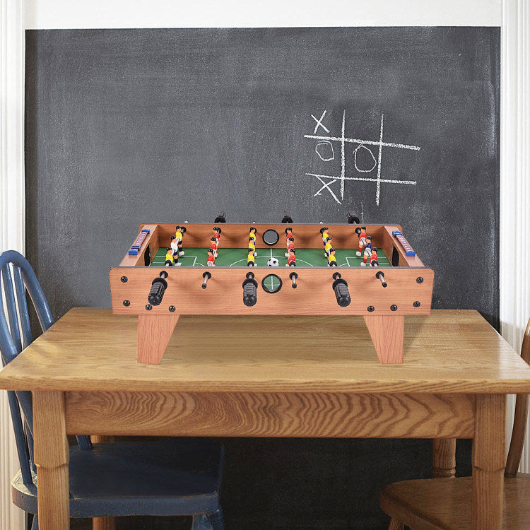 A Family Fun Games Indoor/Outdoor Competition Game Soccer Table with a white background, featuring a MDF frame and steel rods.