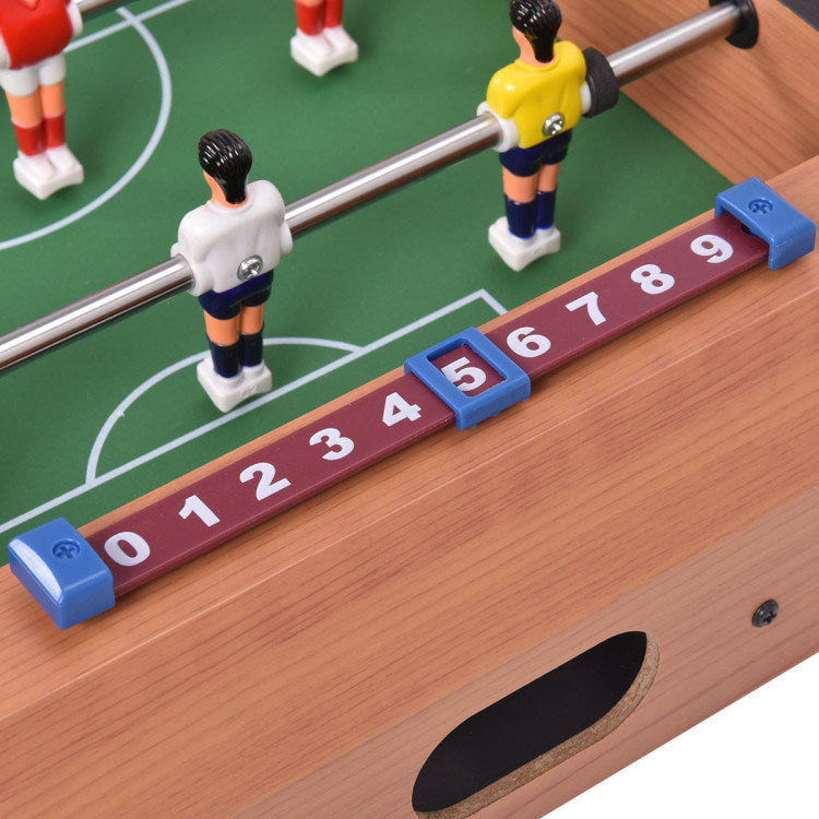 A Family Fun Games Indoor/Outdoor Competition Game Soccer Table with a white background, featuring a MDF frame and steel rods.