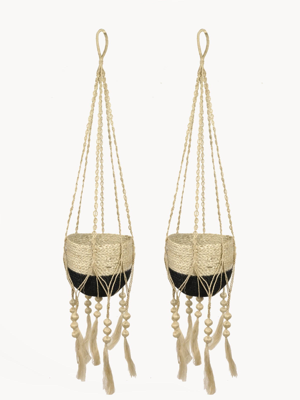 The Plant Hanger - Fiora is a beautiful handmade macramé plant holder, showcasing a black pot adorned with a beige jute rope design, complemented by wooden beads and tassels. Crafted by Fair Trade artisans, it represents sustainable handicraft.