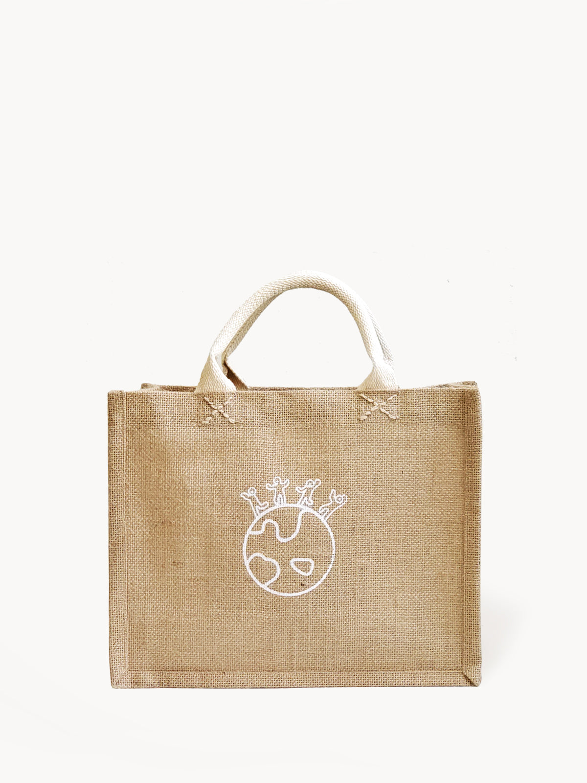 The Gift Bag - Earth is expertly crafted from natural jute fabric, featuring short handles and an enchanting design of a globe with a plant sprout on one side. Made by Fair Trade artisans, it makes an ideal handmade gift bag for any occasion.