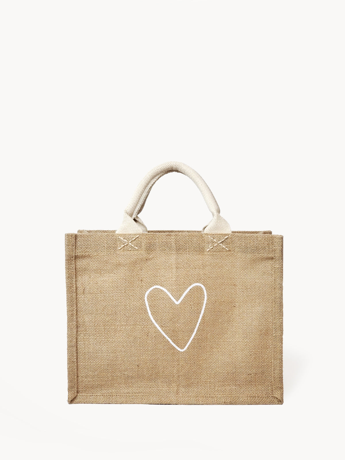 The "Gift Bag - Love" is a beige jute tote bag, handcrafted sustainably with short handles and adorned with a white heart outline on the front.