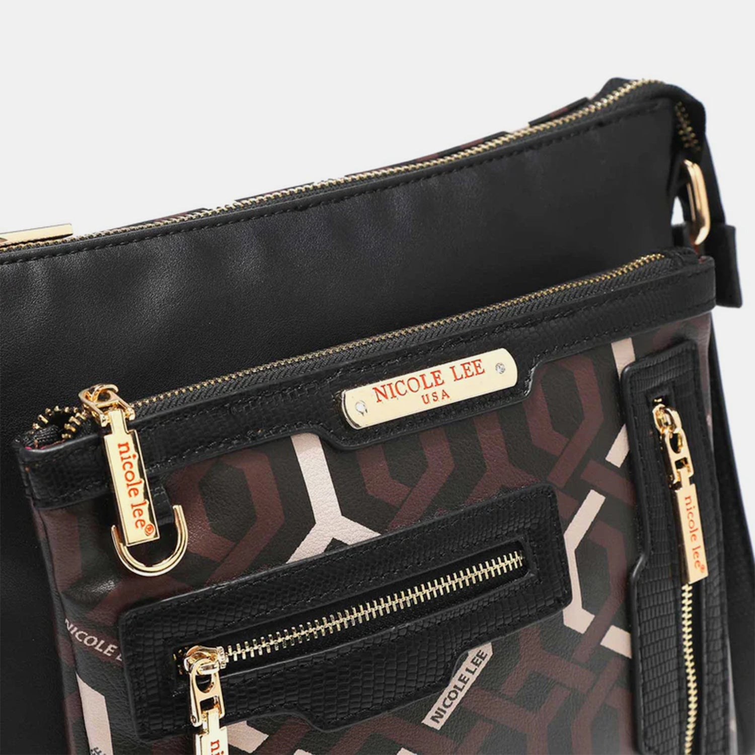 The Nicole Lee USA Geometric Pattern Crossbody Bag is a chic accessory made from vegan leather, featuring a striking geometric design, multiple front zipper pockets, and elegant gold-tone hardware.