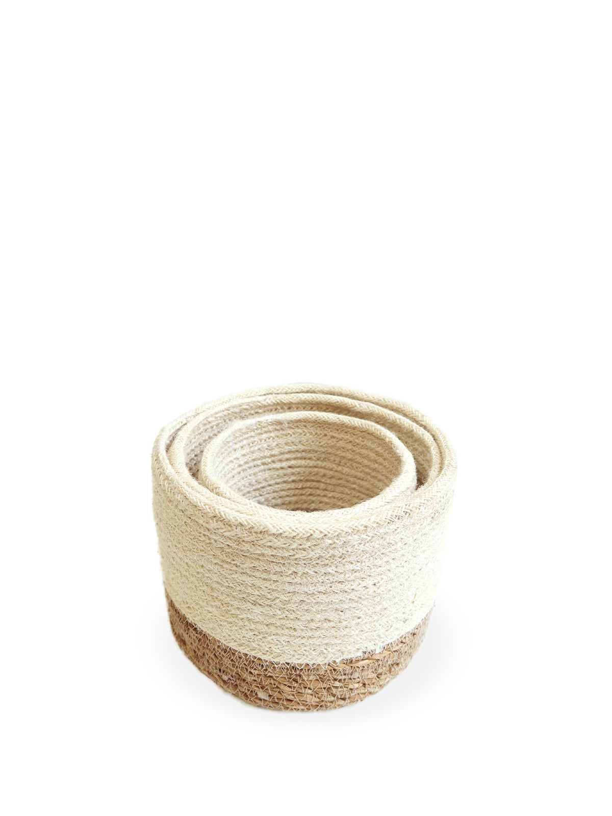 Three Savar Bins, woven sustainably by Fair Trade artisans in varying sizes, each featuring a beige upper half and a brown lower half, are arranged in a row.