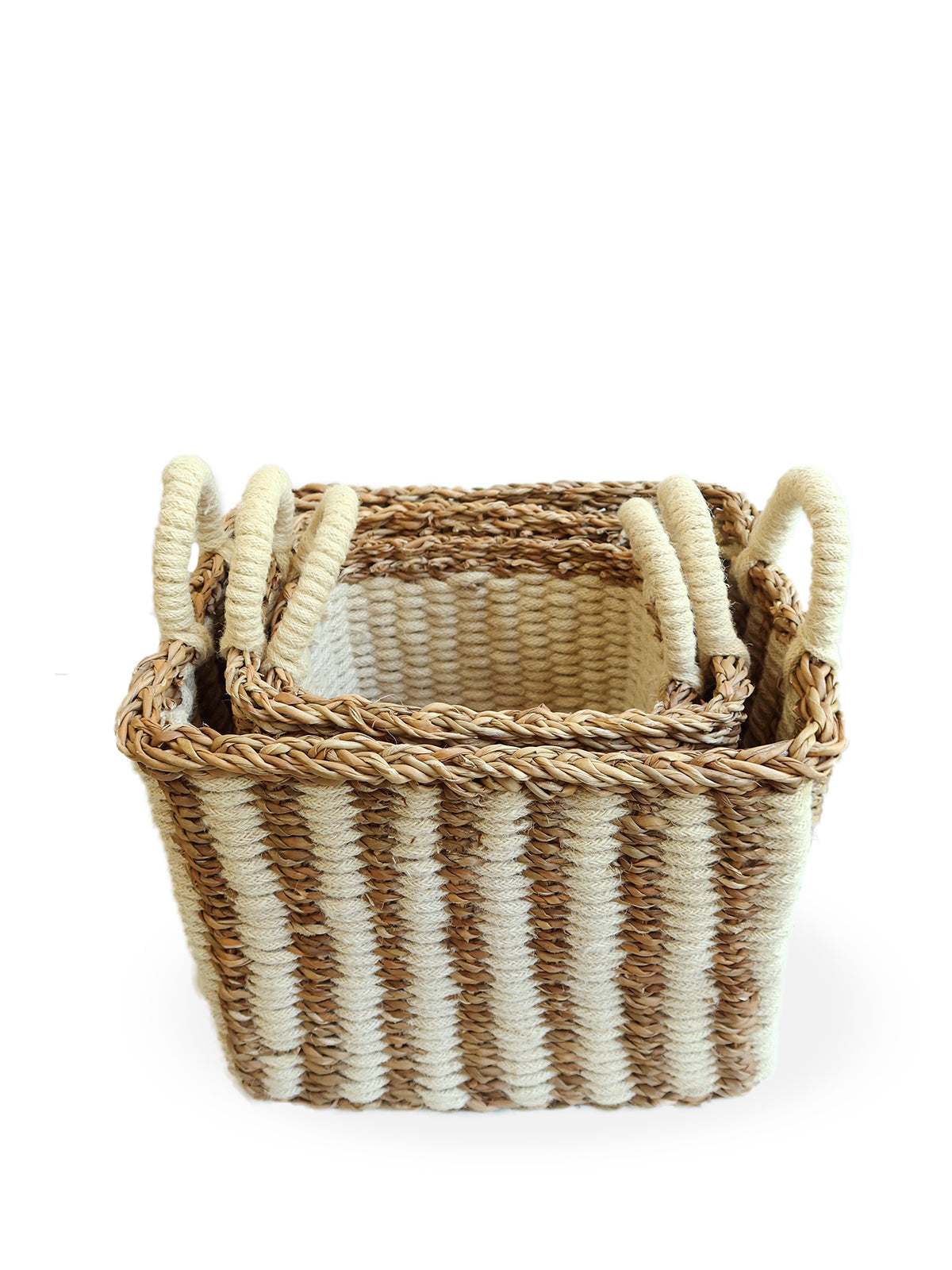 The Ula Storage Baskets, a set of three handmade options with handles in different sizes, are arranged in a row against a plain background. Made from jute wool, these Fair Trade baskets highlight artisanal craftsmanship and sustainable design.