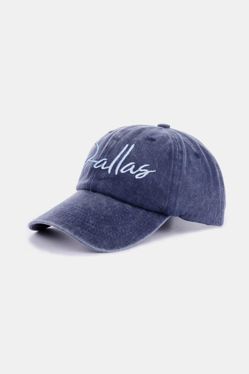 The Zenana Washed DALLAS Embroidered Baseball Cap is a black vintage-style cap featuring the word "Dallas" embroidered in white cursive font on the front, made from 100% cotton.