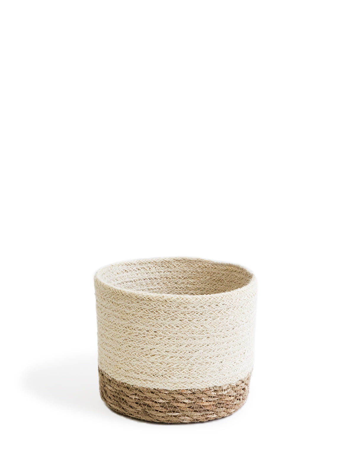 Three Savar Bins, round and handmade from natural seagrass by Fair Trade artisans, are displayed in a row from smallest to largest against a plain white background.